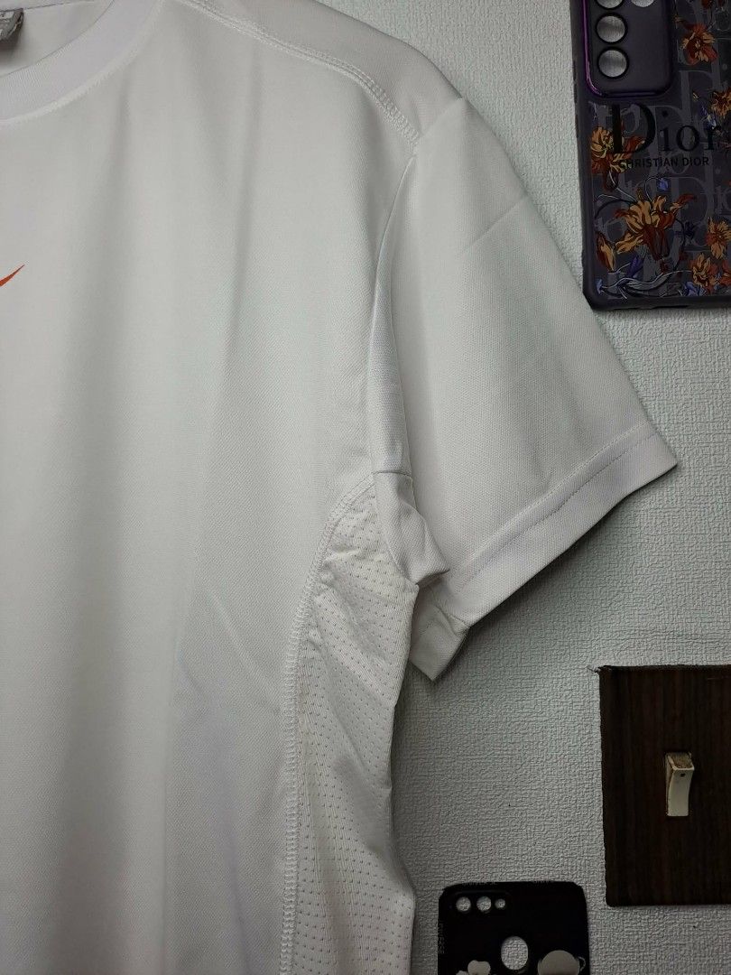 Y2K Nike Swoosh Fit Dry (Category: Tshirts & Polo Shirts ) located in Manila. Submitted by yaseen__73 (Listing ID 1462919674, Image 2). Description: 2000's Nike FiT Dry WARNING ! EXTREME HEAT 08 BALL Breathable Mesh White - Medium on Tag - Dimensions : Please Refer to the Photo - Nearly New Condition - Flawless - PRE OWNED or Best Offer Courier : J&T Express Lalamove MOP : G C A S H B A N K T R A N S F E R Seller's Location: 📍Brgy. Pansol, Q.C.