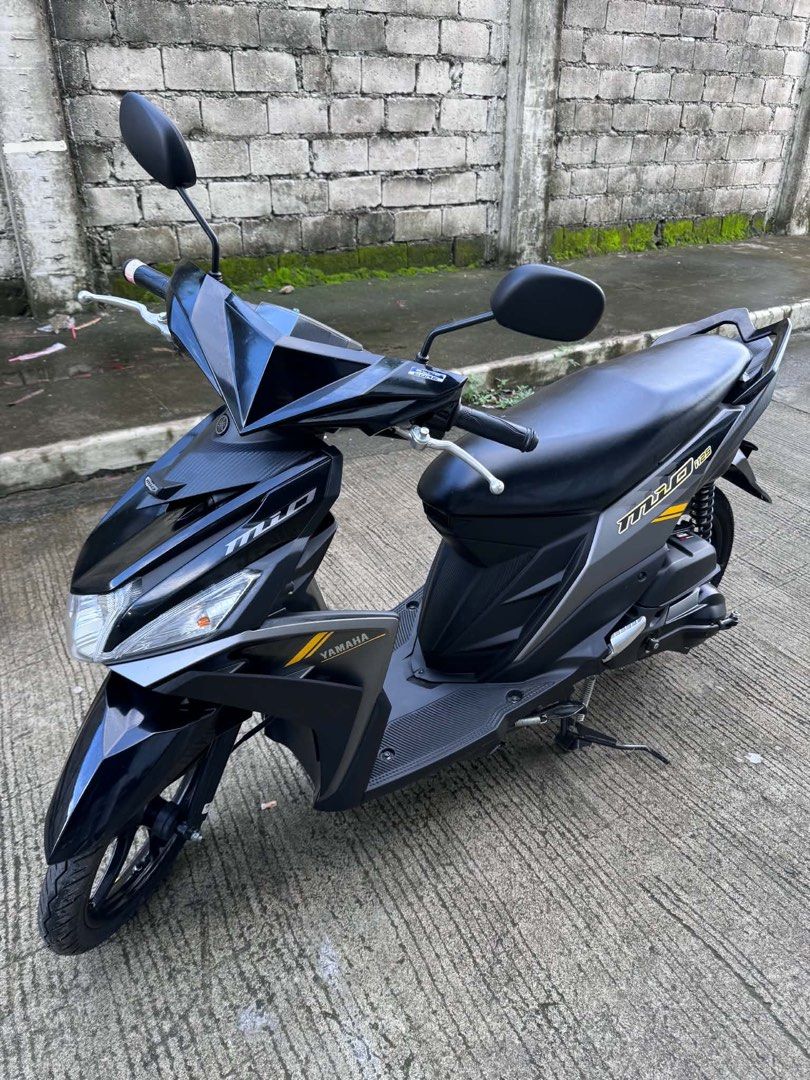 Yamaha Mio i 125 Motorcycle (Category: Motorbikes for Sale) located in Manila. Submitted by decluttergly (Listing ID 1462907982, Image 3). Description: BRANDNEW Yamaha Mio i 125 FOR SALE. Black and grey color scheme. Good for daily commute. Ready to ride. Low mileage. Well maintained. Inquire for more details..
