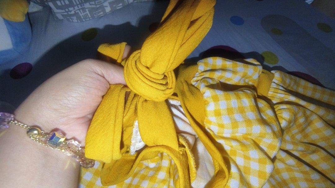 Yellow Gingham Dress with Tie Straps (Category: Dresses) located in Manila. Submitted by rare.elieli (Listing ID 1463078492, Image 2). Description: - Adorable yellow gingham pattern - Straps that are tied for custom fit - Comfortable elasticated waistband - Ideal for casual days or beach getaways - Effortless to wear and style.