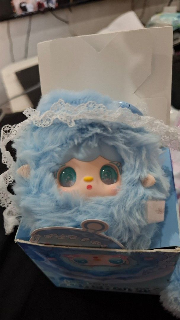 Yooki Blues Bubble (Category: Plushies & Soft Toys) located in Manila. Submitted by jonelllliiii (Listing ID 1462982974, Image 1). Description: - Adorable blue fluffy plush toy - Features big green eyes and a little yellow nose - Delicate white lace trim around the head - Comes with a cute illustrated box - Ideal for collectors or as a thoughtful gift.