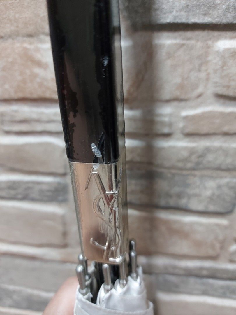 YSL long umbrella with white ribbon design (Category: Other Accessories) located in Quezon City. Submitted by threetwotwo2ndaccount (Listing ID 1462946095, Image 2). Description: YSL long umbrella with white ribbon design no inclusion bawal sa maselan bawal sa barat.