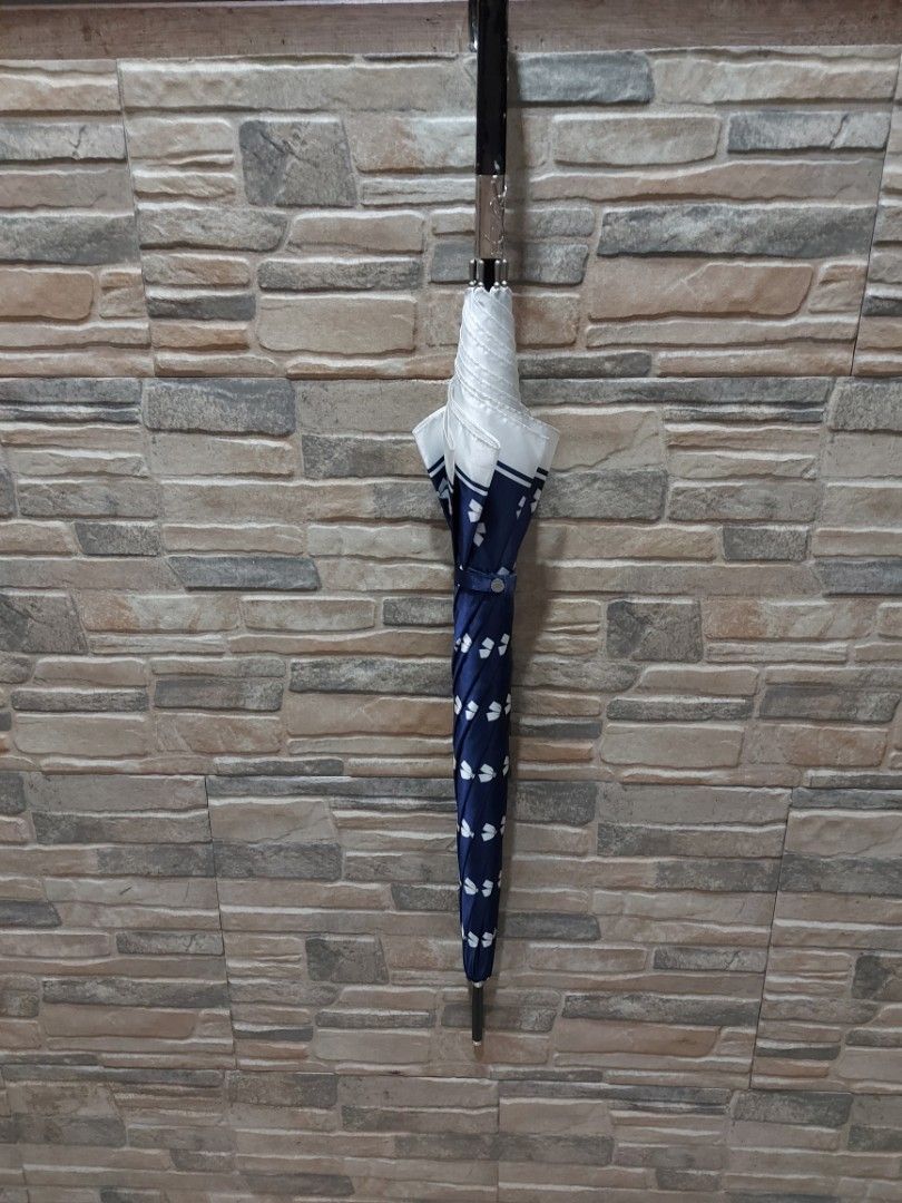 YSL long umbrella with white ribbon design (Category: Other Accessories) located in Quezon City. Submitted by threetwotwo2ndaccount (Listing ID 1462946095, Image 1). Description: YSL long umbrella with white ribbon design no inclusion bawal sa maselan bawal sa barat.