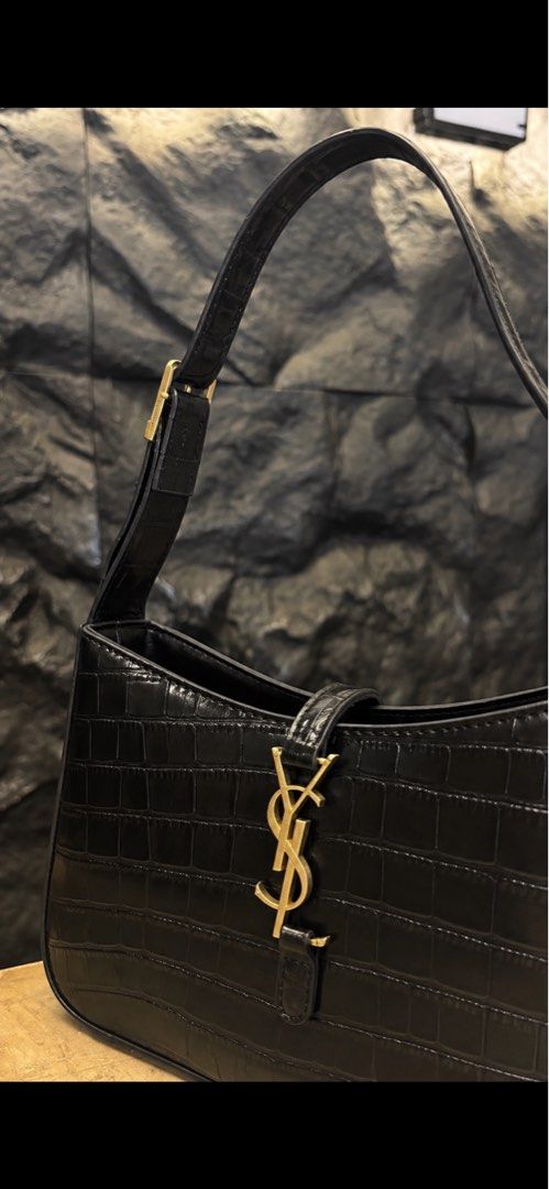 Yves Saint Laurent Black Shoulder Bag - REPLICA (Category: Luxury Bags & Wallets) located in Manila. Submitted by cheetosjalapeno.f6b498 (Listing ID 1463083005, Image 1). Description: - IT IS A REPLICA BAG ONLY - Elegant black shoulder bag - Luxurious croc-embossed texture - Signature gold YSL logo hardware - Includes original box (note: box has some marks) - Bag is in clean condition.
