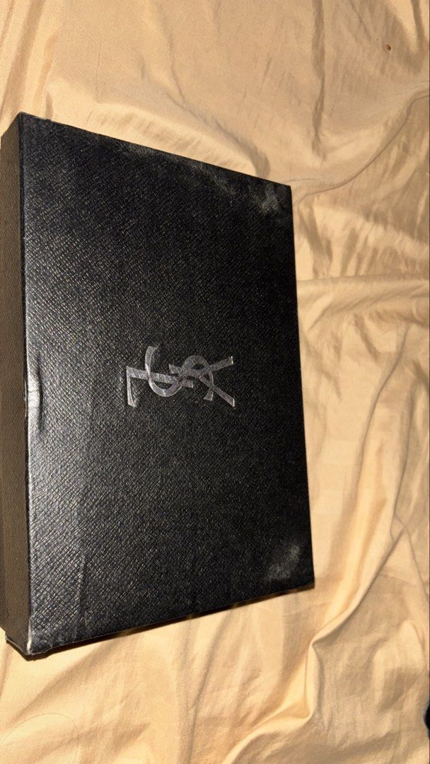 Yves Saint Laurent Black Shoulder Bag - REPLICA (Category: Luxury Bags & Wallets) located in Manila. Submitted by cheetosjalapeno.f6b498 (Listing ID 1463083005, Image 2). Description: - IT IS A REPLICA BAG ONLY - Elegant black shoulder bag - Luxurious croc-embossed texture - Signature gold YSL logo hardware - Includes original box (note: box has some marks) - Bag is in clean condition.