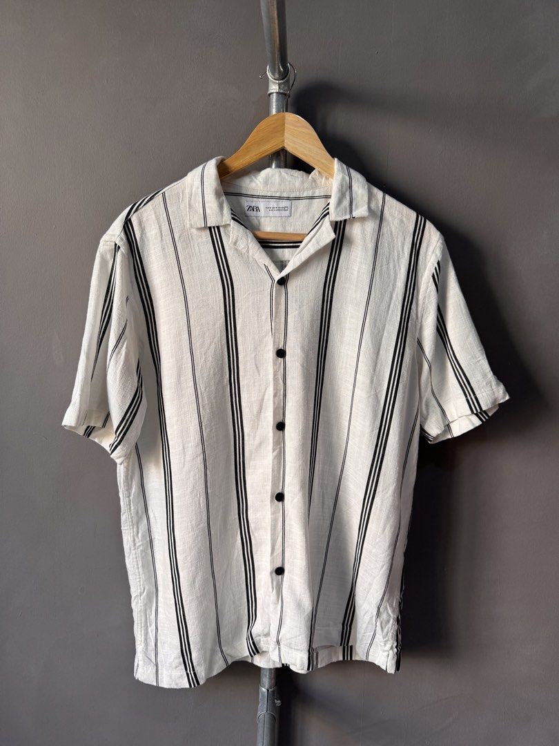 Zara - Striped Short Sleeve button up Shirt (Category: Shirts) located in Cabuyao City. Submitted by _streetflavor (Listing ID 1462939177, Image 1). Description: Zara - Striped Short Sleeve button up Shirt Excellent Size: medium Length: 27.5 Width: 21 -880 pesos Dm.
