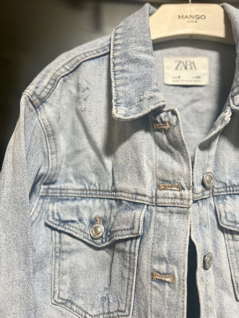 Zara Kids Denim Jacket Size 8 (Category: Babies & Kids Fashion) located in Cainta. Submitted by preloved_sale8 (Listing ID 1462891607, Image 2). Description: - Zara Kids Light Wash Denim Jacket - Size: 8 (CM128) - Classic button-up front - Two chest pockets - Distressed fabric details - Made in Bangladesh.