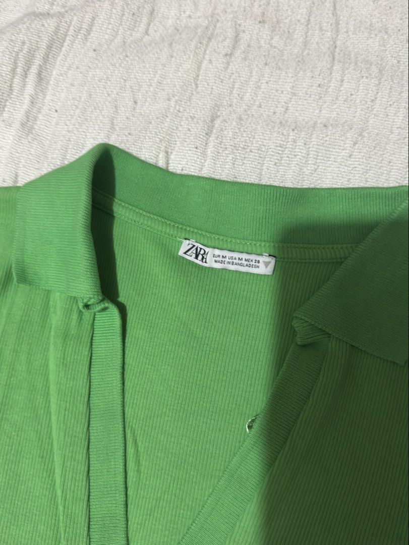 Zara Ribbed Collared Crop Top Green (Category: Shirts) located in Manila. Submitted by kopibreyk (Listing ID 1463014808, Image 2). Description: - Zara green ribbed crop top - Features a collar and V-neck opening - Short sleeves - Estimated size: Medium - Versatile for casual or dressed-up looks.