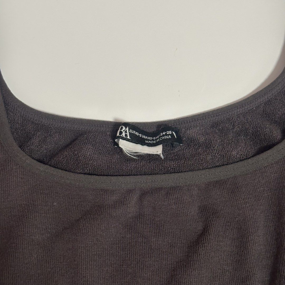 Zara Ribbed Square Neck Dark Gray Crop Top (Category: Shirts) located in Quezon City. Submitted by gg.finds (Listing ID 1462947151, Image 3). Description: - new, only worn once, no tag - ribbed tank crop top, super comfy material inside - square neck, stretchable, thick straps - size is XS to Small - color is Dark Gray - rfs: decluttering, won’t wear.