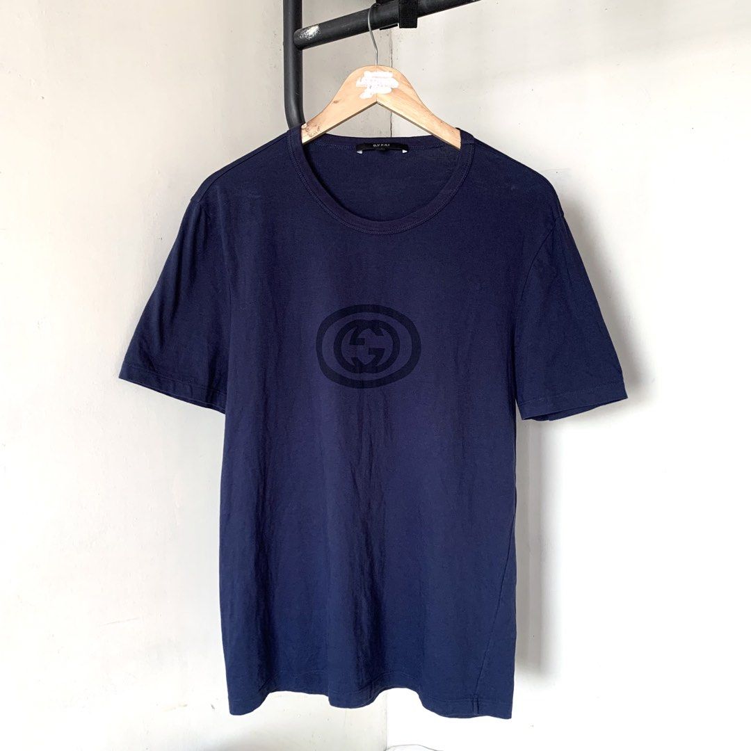 2000s Gucci Tee (Category: Luxury Apparel) located in Cebu City. Submitted by thegoodleftovers (Listing ID 1463217246, Image 1). Description: GUCCl Navy blue •Condition: 9.5/10 •Color rate: 9.5/10 •Issue: none •Size: L Lenth 28 Width 21 Php + sf 📩 more details Cebu City.