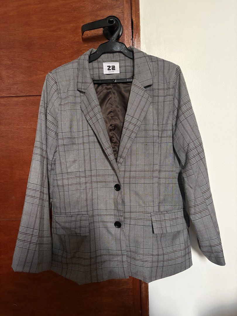 22 Made by Korea Plaid Blazer (Category: Coats, Jackets and Outerwear) located in Taguig. Submitted by cftbncs (Listing ID 1463176804, Image 1). Description: - Grey plaid blazer - Brand: 22 Made by Korea - Two-button closure - Front pockets - Fully lined interior - Ideal for layering over tops or dresses - Creates a sharp, put-together look.