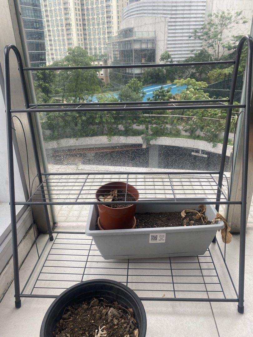3 Layer Metal Plant Rack (Category: Pots & Planters) located in Makati City. Submitted by ann.declutter (Listing ID 1463192665, Image 1). Description: Length 24.8 inches / 63 cm Width 12.2 inches / 31 cm Height 27.1 inches / 69 cm.
