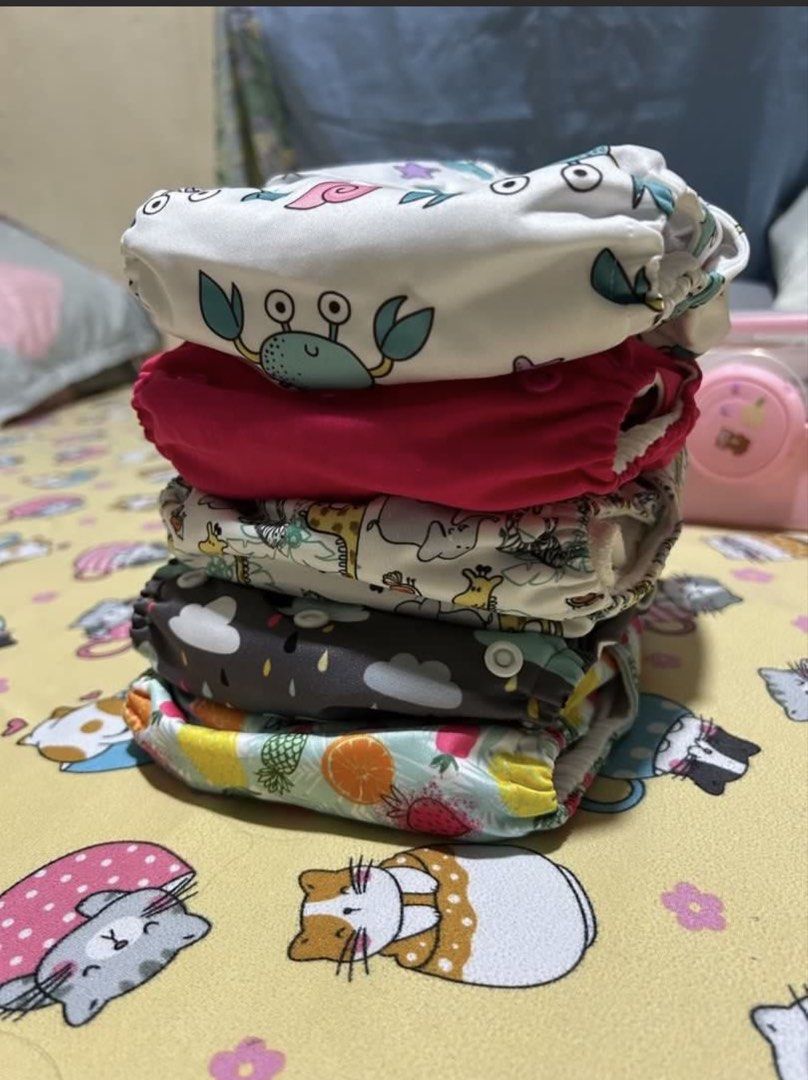 Cloth diaper (Category: Diapers & Baby Wipes) located in Imus. Submitted by mommaerika (Listing ID 1463242777, Image 2). Description: ❗90 each or 399 take all❗ - Mixed of Alva baby and Happy flute CDs - Includes 5 inserts - Comes with Aimerie Laundry Treatment (almost 20-25g remaining) for deep cleaning Rfs: Di talaga kaya ng schedule mag-CD. 🥲 Let go ko na lang yung remaining CDs ni lo. Buhay na Tubig Imus location.