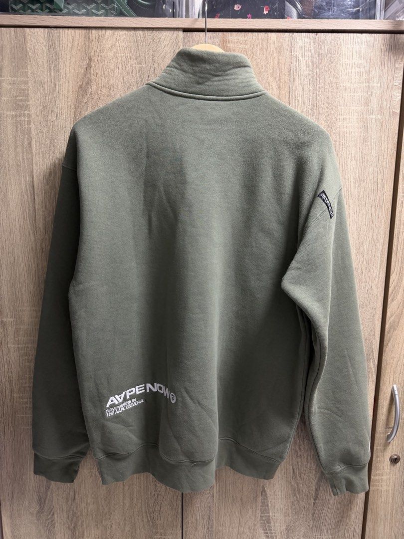 AAPE Now Quarterzip Sweatshirt (Category: Coats, Jackets and Outerwear) located in Cavite. Submitted by PRIVATE.Selection (Listing ID 1463191956, Image 3). Description: AAPE Now Quarterzip Sweatshirt Size Medium W 22 L 28 Good as new Issue: Minor discoloration in front of embroid logo.