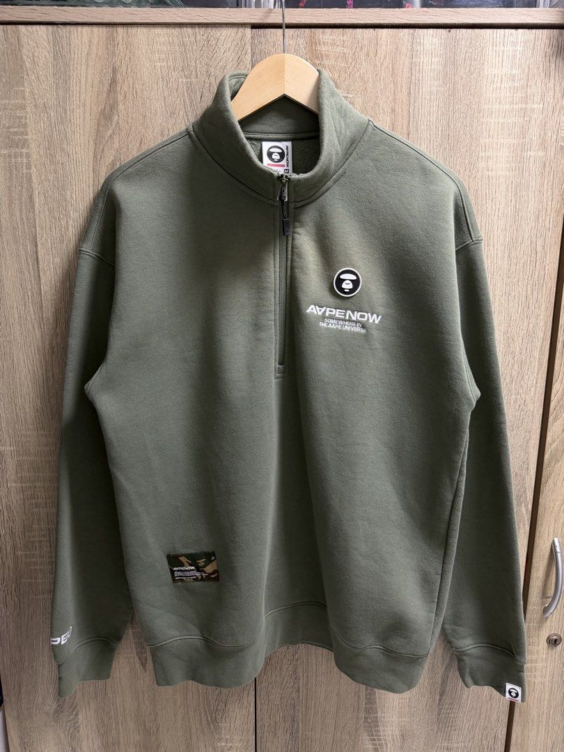 AAPE Now Quarterzip Sweatshirt (Category: Coats, Jackets and Outerwear) located in Cavite. Submitted by PRIVATE.Selection (Listing ID 1463191956, Image 2). Description: AAPE Now Quarterzip Sweatshirt Size Medium W 22 L 28 Good as new Issue: Minor discoloration in front of embroid logo.