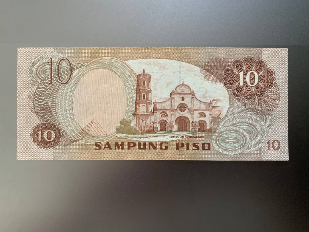 ABL - 10 peso (red serial) (Category: Currency) located in Indang. Submitted by vykolektor (Listing ID 1463185972, Image 2). Description: ABL 10 peso Marcos-Fernandez Red serial Condition in photos.