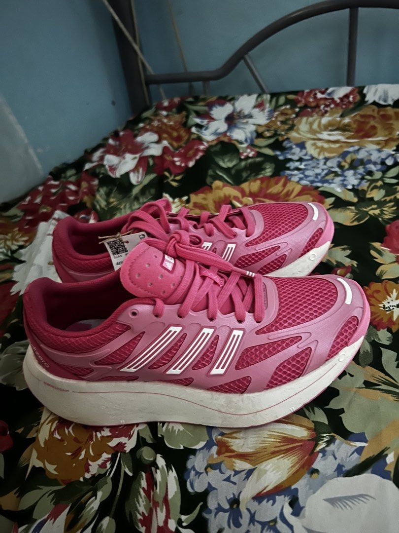 Adidas Adizero Aruku (Category: Sneakers) located in Noveleta. Submitted by okitch (Listing ID 1463227976, Image 1). Description: - Pink Adidas Adizero running shoes - Lightweight and breathable mesh upper - Iconic Adidas stripes - Comfortable and supportive sole - Ideal for running or everyday wear - Ready for a new owner.