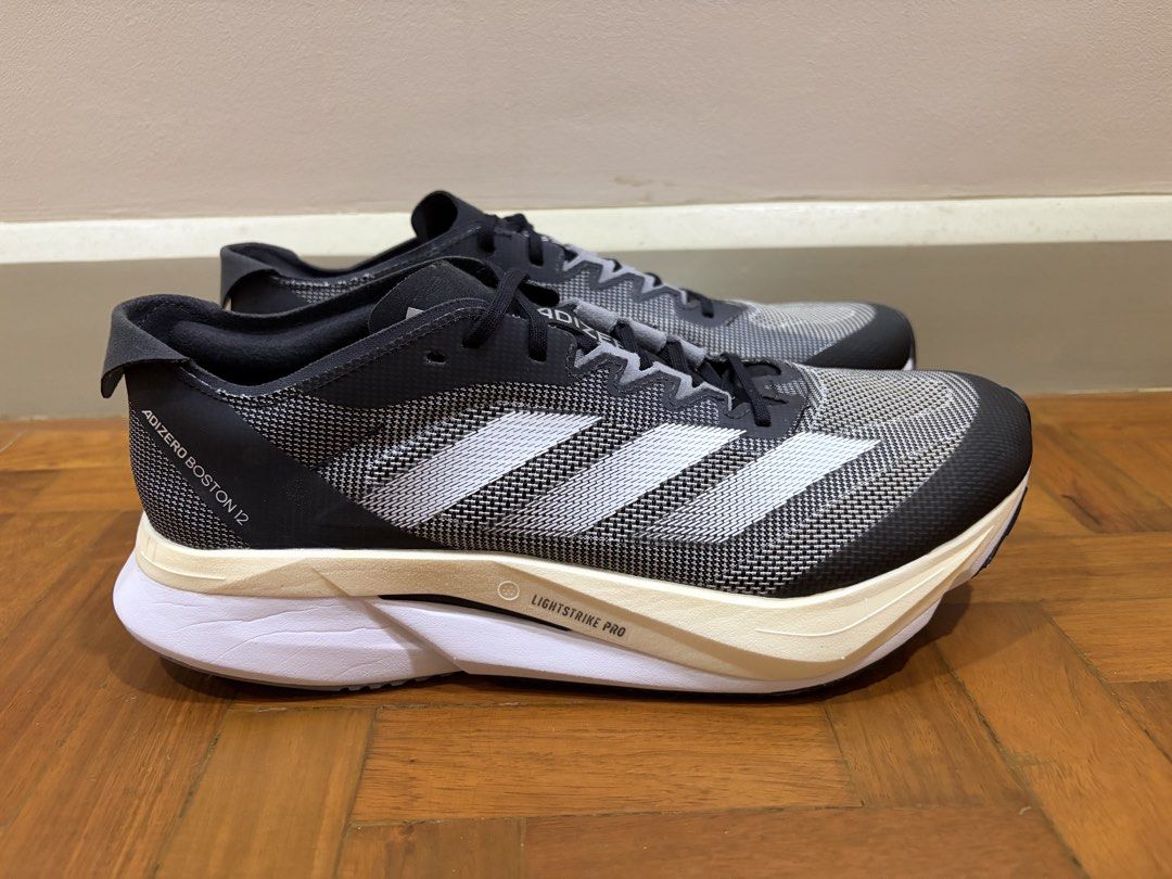 Adidas Adizero Boston 12 (Men’s) (Category: Sneakers) located in Quezon City. Submitted by green.archer (Listing ID 1463200919, Image 2). Description: SALE! Adidas Adizero Boston 12 (Men’s) - Color: Core Black/Cloud White/Carbon - Size: 9.5 US (Men’s) - Well-Kept (Almost Brand New) - 100 % Authentic - Mall Price: 8,000 SALE Price: 3,500! Call/Text if Interested: 09209068636.