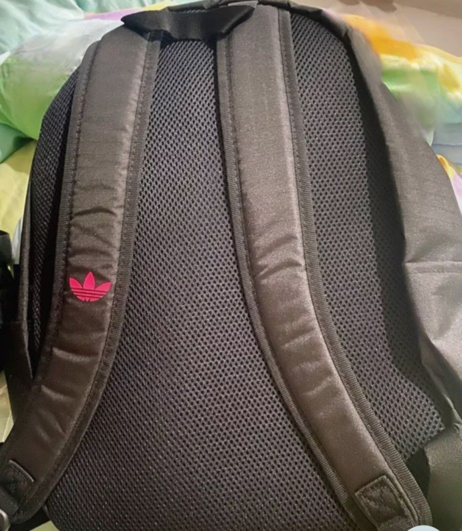 Adidas Backpack Black Pink Trefoil Logo (Category: Backpacks) located in Manila. Submitted by hannsjewels (Listing ID 1463222358, Image 3). Description: - Brand new Adidas backpack - Bright pink front pocket - Classic three stripes and trefoil logo - Mesh detail on the front orig price Php 2700 measurements: height 17 inch width 13 inch reflectorized other photo (not mine) for reference only. - Padded straps for comfort - Ideal for school or ever