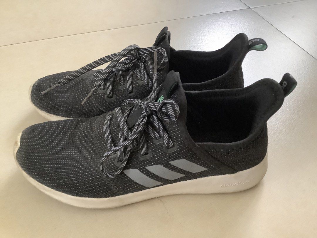 Adidas Cloudfoam Running Shoes (Category: Sneakers) located in Quezon City. Submitted by allthingsprelovedandbranded (Listing ID 1463144926, Image 1). Description: - Brand: Adidas - Color: Black with Grey Stripes - Features: Cloudfoam cushioning for ultimate comfort - Closure: Lace-up - Origin: Made in Indonesia - Size: 7 US Women's - Ideal for: Running, workouts, or casual wear.