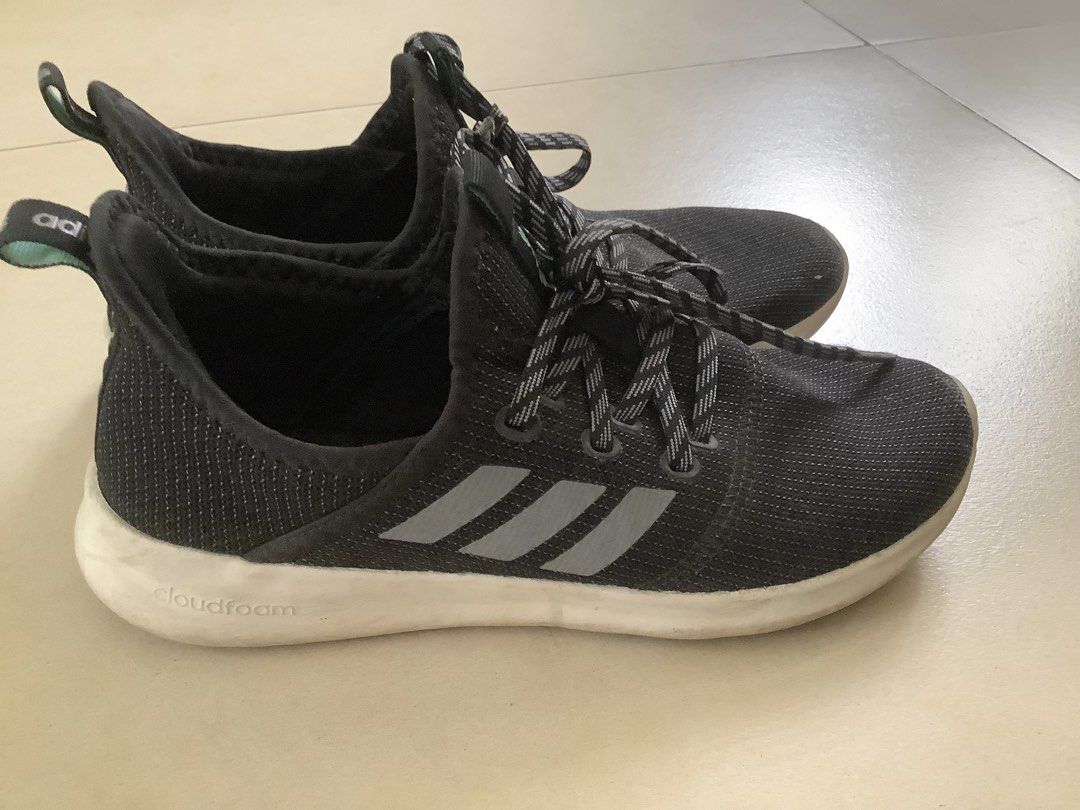 Adidas Cloudfoam Running Shoes (Category: Sneakers) located in Quezon City. Submitted by allthingsprelovedandbranded (Listing ID 1463144926, Image 3). Description: - Brand: Adidas - Color: Black with Grey Stripes - Features: Cloudfoam cushioning for ultimate comfort - Closure: Lace-up - Origin: Made in Indonesia - Size: 7 US Women's - Ideal for: Running, workouts, or casual wear.