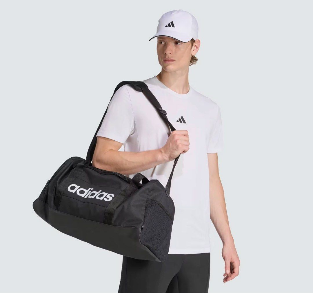 Adidas Lifestyle Linear Duffel Medium Unisex Black (Category: Cross-body Bags) located in Makati City. Submitted by blissfulmom09 (Listing ID 1463323822, Image 2). Description: Brand New / Sealed with tag RFS: Business - gift shop 100% authentic purchased from Store **Money Back GUARANTEED** SRP: 1800.00 Selling for only 1100.00 SDD - Lalamove / Grab LBC / JRS / J&T.