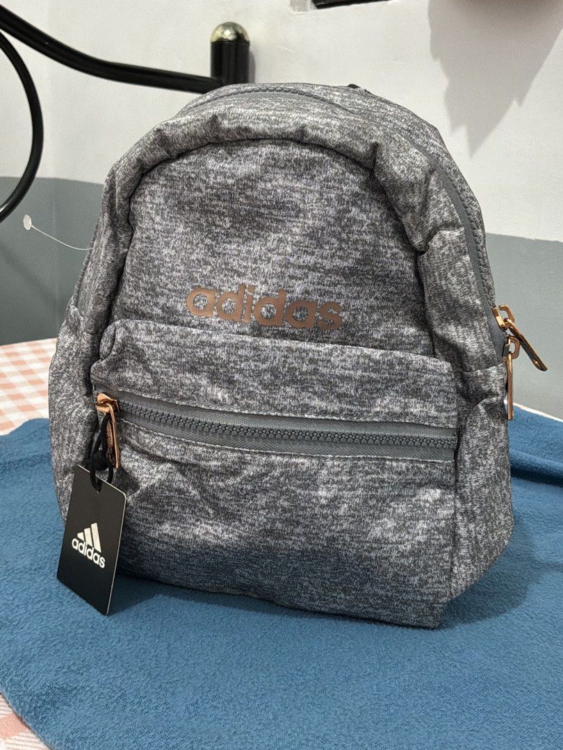 BN and Authentic - Adidas Mini Backpack (Category: Backpacks) located in Gapan. Submitted by isabeltries (Listing ID 1463231055, Image 2). Description: BRAND NEW and ORIGINAL - Adjustable shoulder straps for a comfortable fit - Compact and perfect for everyday use - Dimensions: 10.5 inches (H) x 8.5 inches (W) x 6 inches (D) ₱850 + shipping fee .