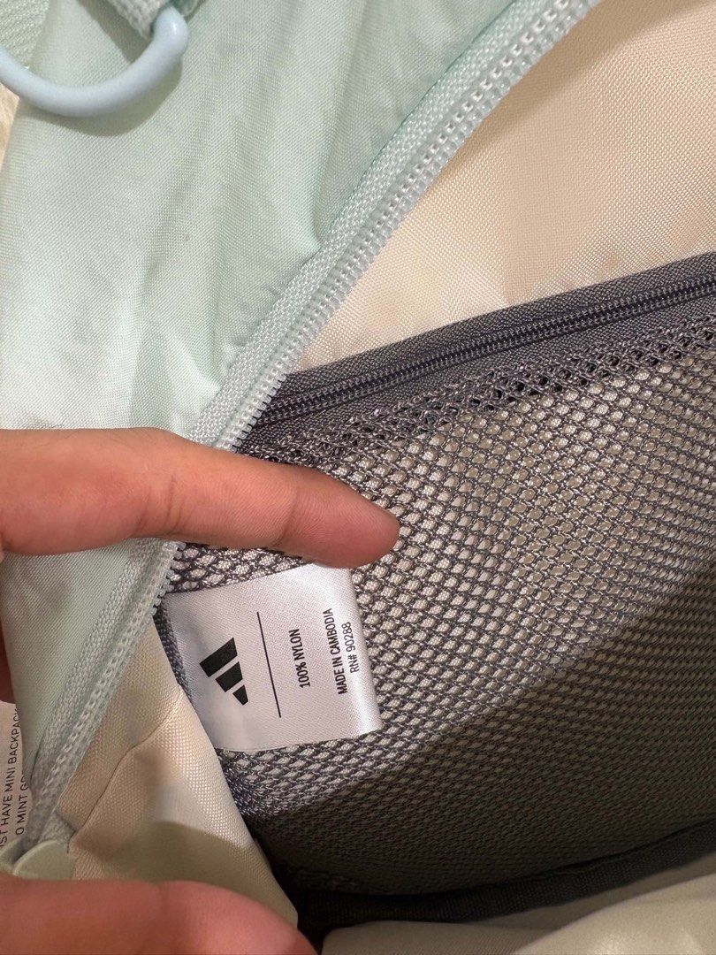 Adidas Mini Backpack Mint Green (Category: Backpacks) located in Manila. Submitted by aikhielfri01619 (Listing ID 1463247539, Image 2). Description: - Adorable mint green Adidas mini backpack. - Crafted from durable 100% nylon. - Features a spacious main compartment. - Includes a convenient front zip pocket. - Adjustable straps for a comfortable fit. - Ideal for everyday errands or your next getaway. - Compact size: approximately 10 inches tall..