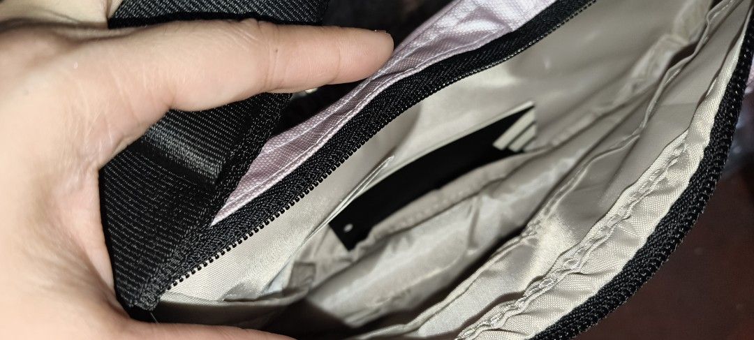 Adidas Pink Crossbody Bag (Category: Cross-body Bags) located in Manila. Submitted by yahs04 (Listing ID 1463240455, Image 2). Description: - Pink Adidas crossbody bag - Main zippered compartment - Adjustable strap - Ideal for everyday use or travel - Lightweight and easy to carry - Features the iconic Adidas logo on the front.
