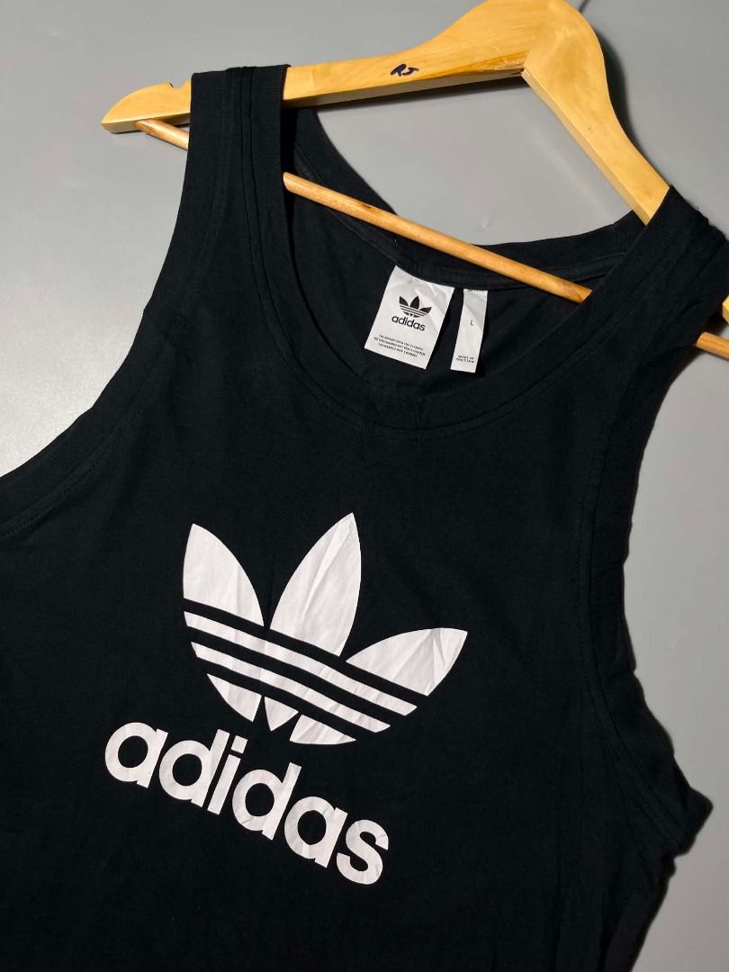 ADIDAS SANDO (Category: Formal Shirts) located in General Santos City (Dadiangas). Submitted by arjay_genita (Listing ID 1463159527, Image 2). Description: Adidas Sando ‼️Size Medium to Large (19/28) ‼️Excellent condition ‼️Color rate 9.5./10 ‼️No issue.