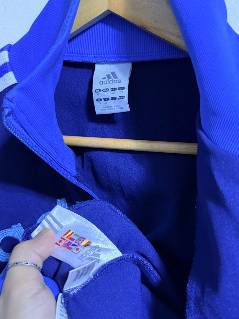 Adidas Track Jacket Blue White Stripes (Category: Babies & Kids Fashion) located in Paete. Submitted by skydruemadison (Listing ID 1463239726, Image 2). Description: - Classic Adidas track jacket - Royal blue with white sleeve stripes - Adidas logo across the chest - Zipper closure - Chest pocket - Ribbed cuffs and hem - Ideal for casual wear or sports.
