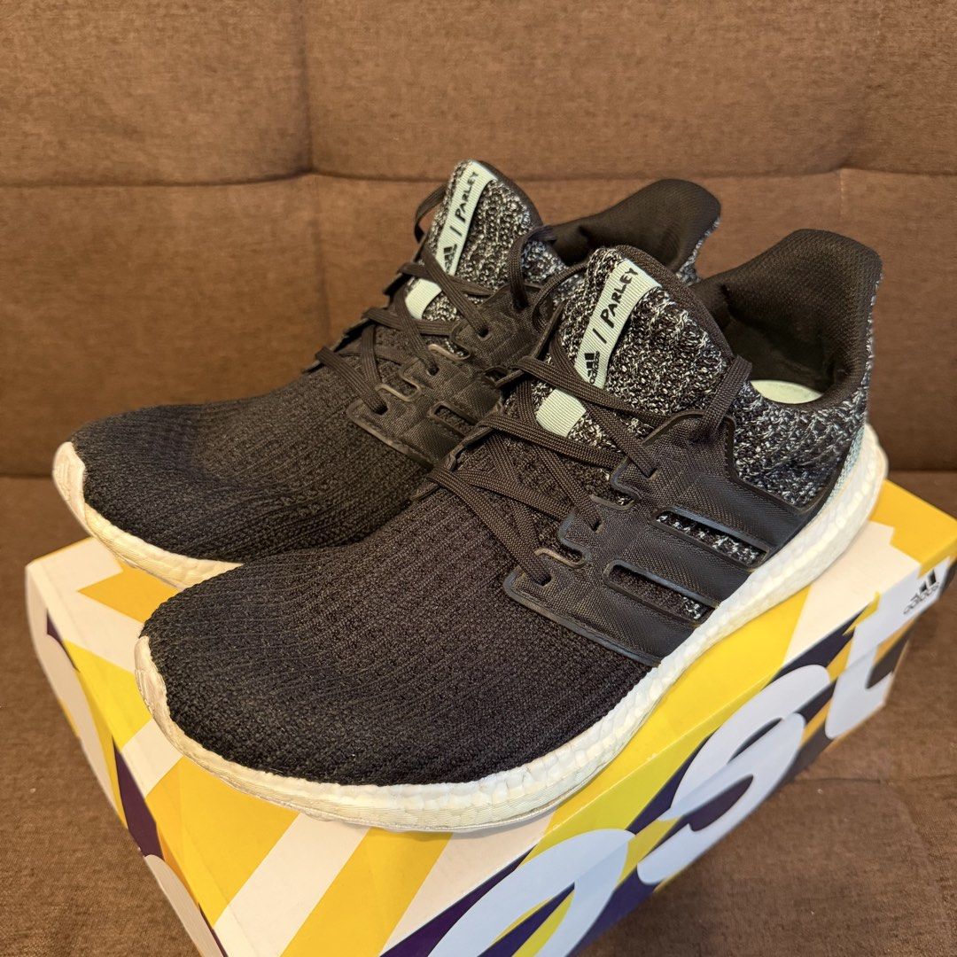 Adidas UltraBOOST PARLEY (Category: Sneakers) located in Pasay City. Submitted by joshwhacker (Listing ID 1463192545, Image 1). Description: - Adidas Ultraboost Parley - Color: Black knit upper with white Boost sole - Features Parley branding on the tongue - Ideal for running and everyday wear - Comes with original box - Issue - Minor sole sep in left pair (as seen in pics).