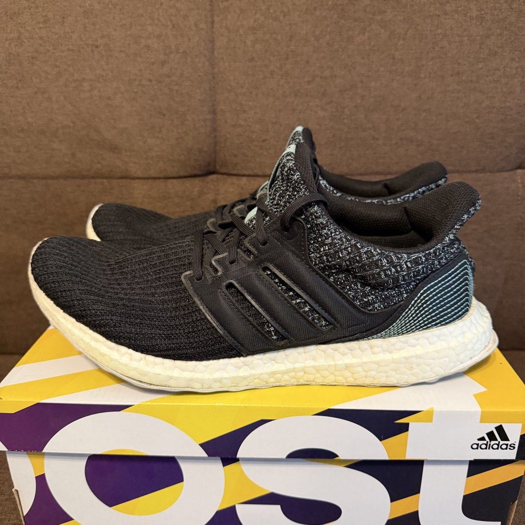 Adidas UltraBOOST PARLEY (Category: Sneakers) located in Pasay City. Submitted by joshwhacker (Listing ID 1463192545, Image 3). Description: - Adidas Ultraboost Parley - Color: Black knit upper with white Boost sole - Features Parley branding on the tongue - Ideal for running and everyday wear - Comes with original box - Issue - Minor sole sep in left pair (as seen in pics).