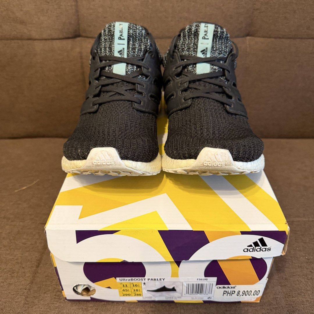 Adidas UltraBOOST PARLEY (Category: Sneakers) located in Pasay City. Submitted by joshwhacker (Listing ID 1463192545, Image 2). Description: - Adidas Ultraboost Parley - Color: Black knit upper with white Boost sole - Features Parley branding on the tongue - Ideal for running and everyday wear - Comes with original box - Issue - Minor sole sep in left pair (as seen in pics).