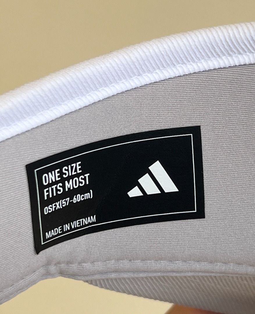 Adidas White Visor Cap unisex (Category: Caps & Hats) located in Dumaguete. Submitted by gian225 (Listing ID 1463157349, Image 2). Description: - White Adidas visor - Classic 3-stripe logo on front - One size fits most - Adjustable strap at the back - Made in Vietnam - Ideal for sports (pickleball/tennis) - Used once only .