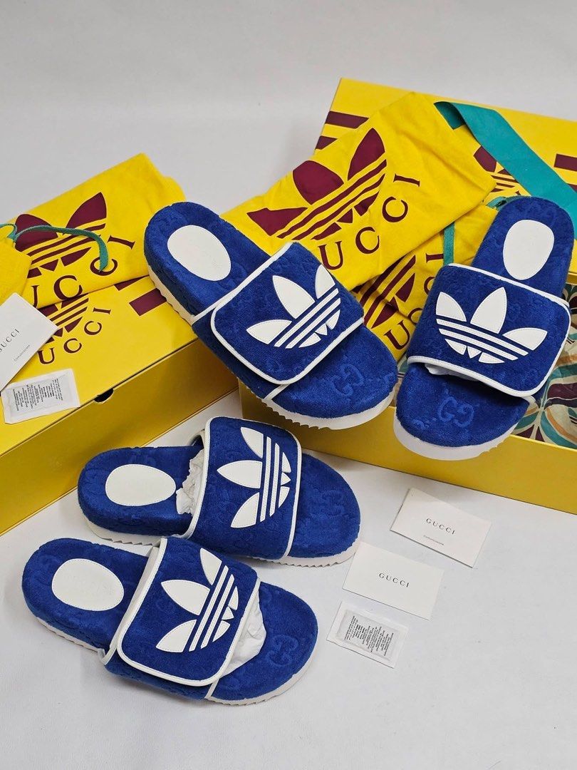 ADIDAS x GUCCI PLATFORM SLIDES 💙 (Category: Sneakers & Footwear) located in Mandaluyong City. Submitted by luxprelovedbagsparadise (Listing ID 1463177264, Image 1). Description: ADIDAS x GUCCI PLATFORM SLIDES — ₱19,000 ONLY! ✨💙 SPORTY. LUXE. ICONIC. 👟🔥 A statement-making collaboration combining adidas’ signature stripes with Gucci’s iconic GG monogram and Trefoil details. Perfect for that luxury streetwear look! 💙 🔥 STEAL DEAL: ₱19,000 ONLY