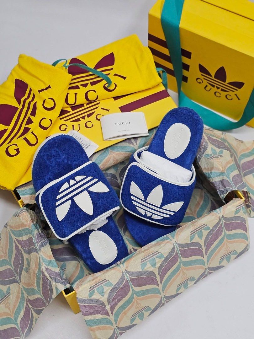 ADIDAS x GUCCI PLATFORM SLIDES 💙 (Category: Sneakers & Footwear) located in Mandaluyong City. Submitted by luxprelovedbagsparadise (Listing ID 1463177264, Image 2). Description: ADIDAS x GUCCI PLATFORM SLIDES — ₱19,000 ONLY! ✨💙 SPORTY. LUXE. ICONIC. 👟🔥 A statement-making collaboration combining adidas’ signature stripes with Gucci’s iconic GG monogram and Trefoil details. Perfect for that luxury streetwear look! 💙 🔥 STEAL DEAL: ₱19,000 ONLY