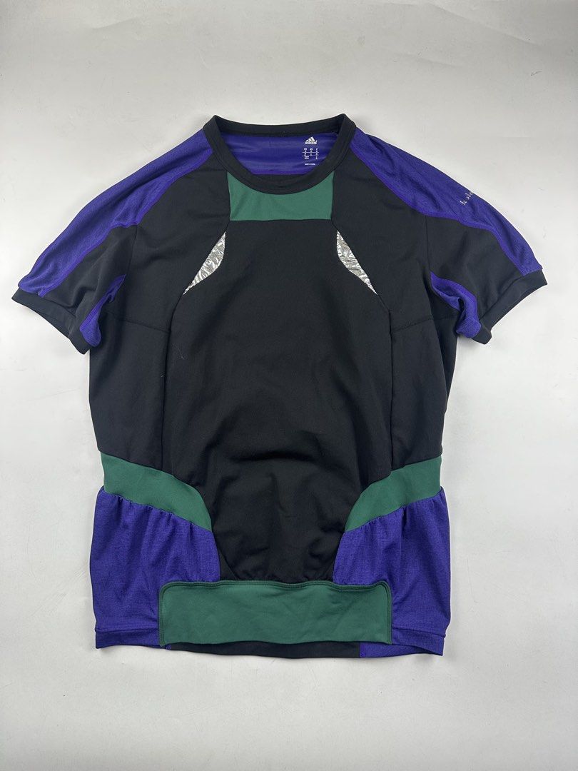 Adidas x Kolor (Category: Tshirts & Polo Shirts ) located in Manila. Submitted by kupal24 (Listing ID 1463243165, Image 1). Description: - Adidas Men's T-shirt - Size: Medium (M) - Color: Black with purple and green accents - Sleeve Length: Short sleeves - Versatile: Great for sports or casual wear - Origin: Made in China - Condition: Please check photos for detailed condition..