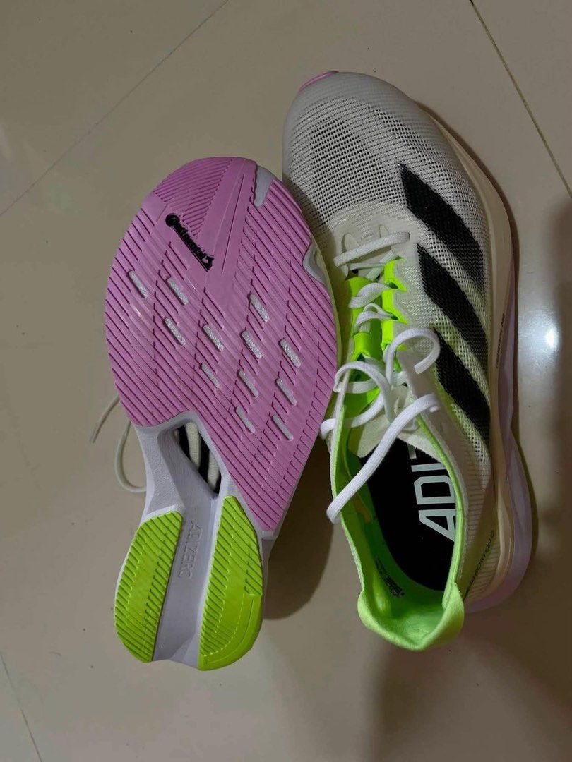 ADIZERO BOSTON 12 (Category: Other Sports Equipment and Supplies) located in Manila. Submitted by katlitter (Listing ID 1463226894, Image 2). Description: FOR SALE ORIGINAL ADIZERO BOSTON 12 Color: Cloud White / Core Black / Green Spark Size: US-8 / UK-7 1/2 / FR-41 1/3 / JP-260 / CHN-255 RFS: Wrong size kaya hindi magamit. Location: Balanga, Bataan - Never worn, brand new. - Bought on Aug. 8, 2026, arrived on Aug. 24, 2026. - Walang box kasi pad