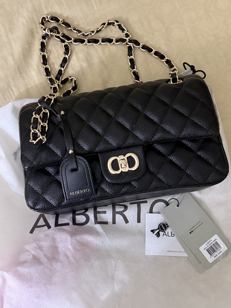 ALBERTO Black Quilted Caviar , Chain Shoulder Bag (Category: Shoulder Bags) located in Quezon City. Submitted by unforgettwble. (Listing ID 1463301694, Image 1). Description: - Brand: ALBERTO - Color: Black - Material: Quilted - Style: Shoulder Bag - Features: Gold chain strap, signature clasp - Includes: Original dust bag, original tags - Original Price Tag: PHP 2499.