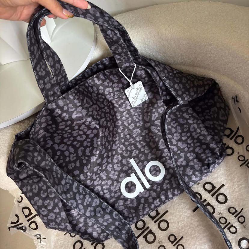 Alo Leopard tote bag (Category: Tote Bags) located in Guinobatan. Submitted by jadieee_young22 (Listing ID 1463251765, Image 2). Description: alo leopard tote bag 🤍 -premium quality 🇻🇳 -actual photos | what you see is what you get -goods for school or work or travel! -can fit your lappy 💻 -shipping nationwide via tiktok co avail colors: green & white .