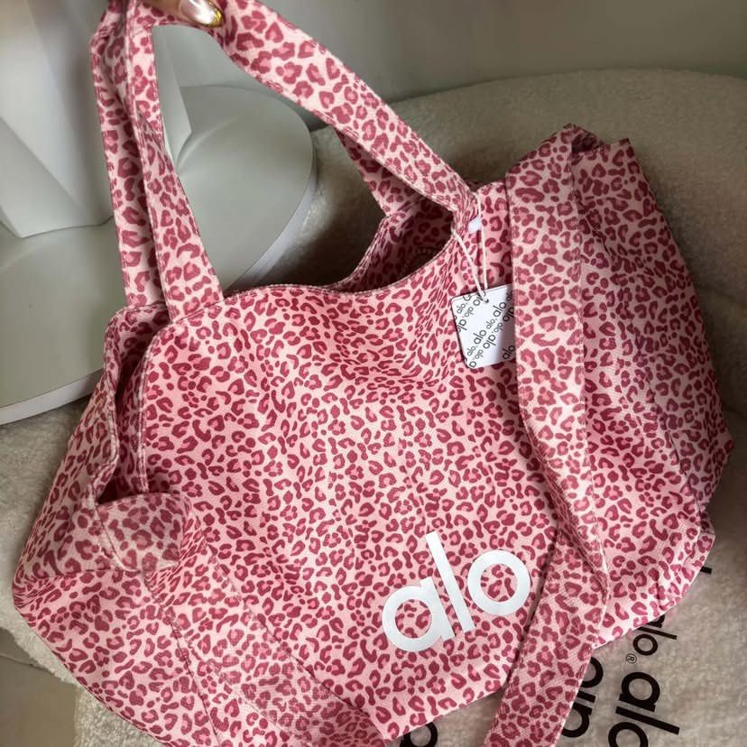 Alo Leopard tote bag (Category: Tote Bags) located in Guinobatan. Submitted by jadieee_young22 (Listing ID 1463251765, Image 1). Description: alo leopard tote bag 🤍 -premium quality 🇻🇳 -actual photos | what you see is what you get -goods for school or work or travel! -can fit your lappy 💻 -shipping nationwide via tiktok co avail colors: green & white .