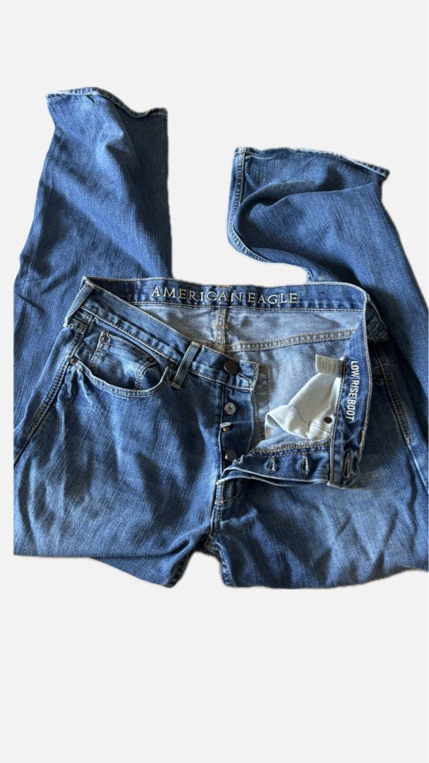 American Eagle Low Rise Boot Jeans (Category: Jeans) located in Quezon City. Submitted by ginoongpablo (Listing ID 1463170921, Image 1). Description: - Classic blue denim jeans from American Eagle - Low rise fit - Bootcut leg opening - Button fly closure - Versatile for any outfit - Ideal for casual everyday wear.