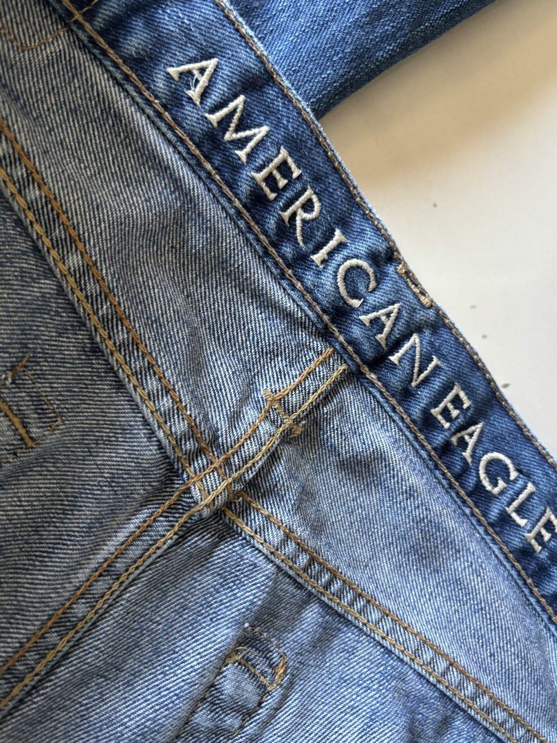 American Eagle Low Rise Boot Jeans (Category: Jeans) located in Quezon City. Submitted by ginoongpablo (Listing ID 1463170921, Image 3). Description: - Classic blue denim jeans from American Eagle - Low rise fit - Bootcut leg opening - Button fly closure - Versatile for any outfit - Ideal for casual everyday wear.