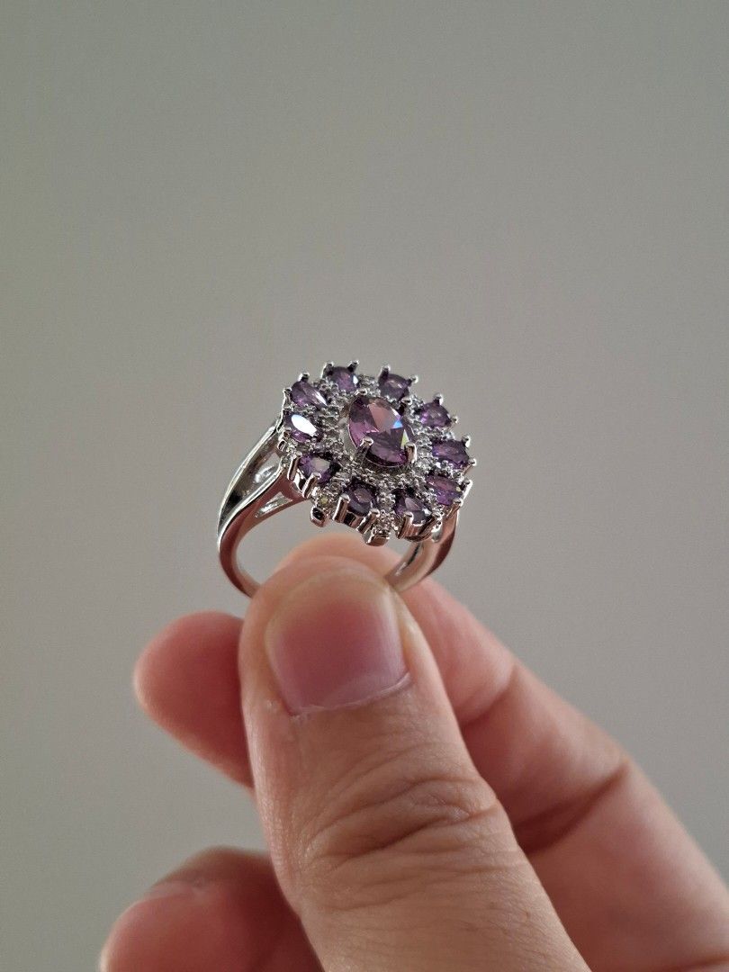 Amethyst Stones Vintage Looking Silver Ring Size 7 (Category: Rings) located in Dasmarinas. Submitted by danabrie22 (Listing ID 1463143391, Image 3). Description: size 7 ring very well-made, excellent crafstmanship 10/10 condition brand new stainless steel & amethyst-colored cubic zirconia stones made in Hongkong.