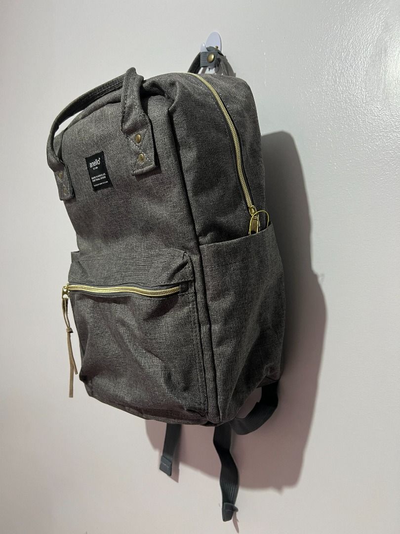 Anello Classic Canvas Backpack (Grey) (Category: Backpacks) located in Caloocan City. Submitted by jpnusapasabuyfindsdvo (Listing ID 1463281644, Image 3). Description: Upgrade your daily commute or casual travels with this stylish and highly functional Anello classic backpack. Known for its signature wide-opening main compartment and sturdy wireframe design, this bag features a spacious interior, convenient side bottle pockets, a front zippered c