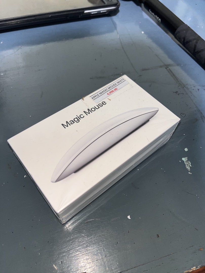 Apple Magic Mouse 2022 (complete packaging & charging cable) (Category: Mouse & Mousepads) located in Manila. Submitted by gotchyann (Listing ID 1463178582, Image 1). Description: - Apple Magic Mouse 2022 - Color: White - Rechargeable battery - Complete with packaging and USB-C to lightning braided charging cable - Unused for the last 3 years; came as freebie from laptop.