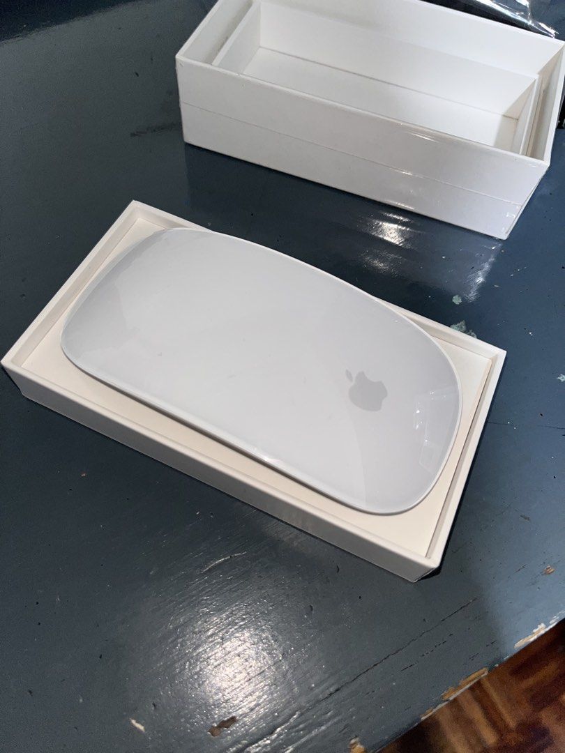 Apple Magic Mouse 2022 (complete packaging & charging cable) (Category: Mouse & Mousepads) located in Manila. Submitted by gotchyann (Listing ID 1463178582, Image 3). Description: - Apple Magic Mouse 2022 - Color: White - Rechargeable battery - Complete with packaging and USB-C to lightning braided charging cable - Unused for the last 3 years; came as freebie from laptop.