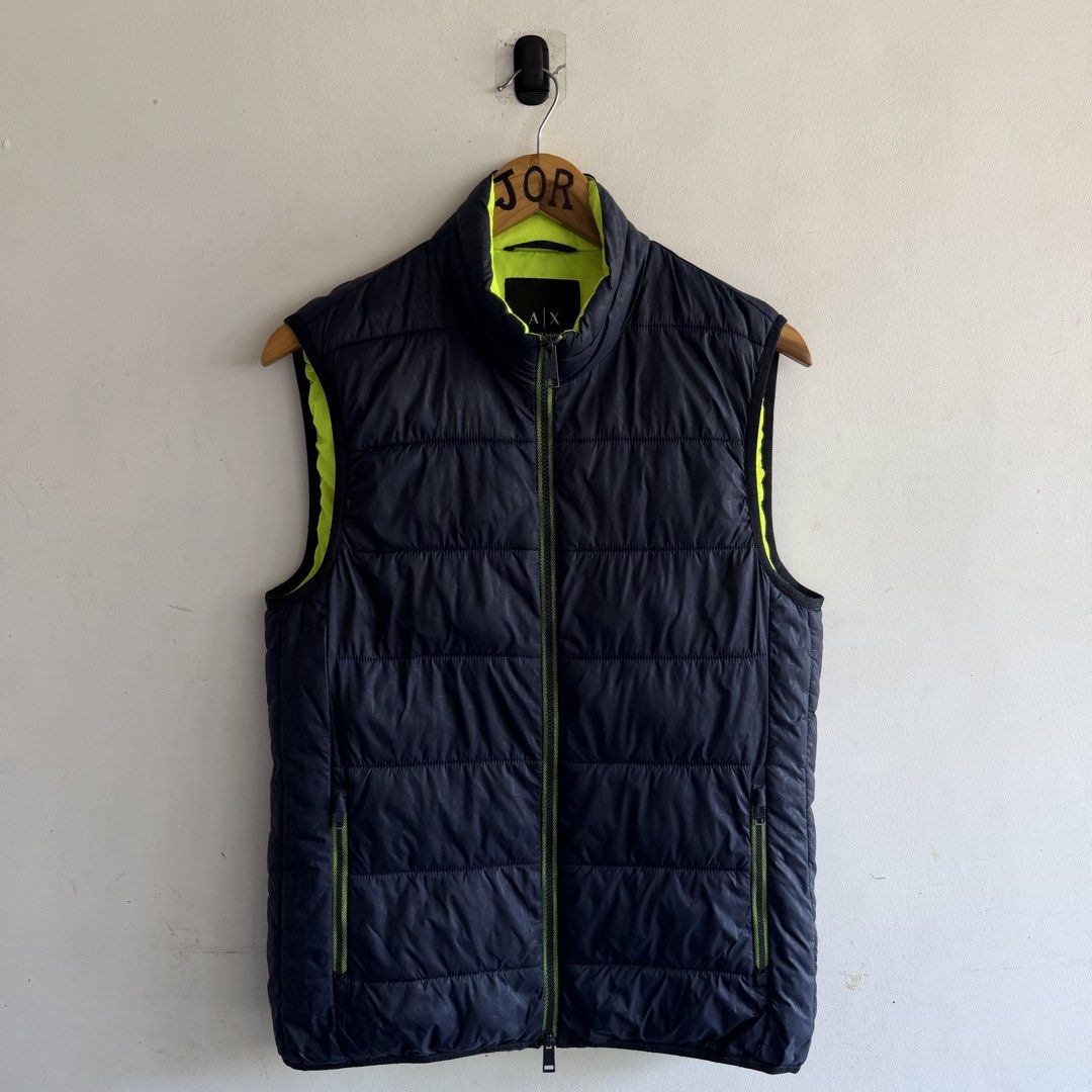 Armani Exchange Monogram Puffer Vest (Category: Coats, Jackets and Outerwear) located in San Fernando. Submitted by jorjorr (Listing ID 1463199763, Image 1). Description: Armani Exchange Monogram Puffer Vest Unisex Small on tag 20 width 27 length Excellent condition No issue P1,699.
