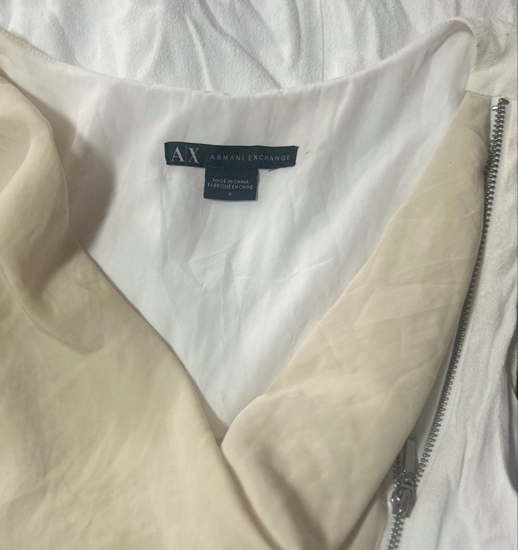 ARMANI XCHANGE (Category: Dresses) located in Davao. Submitted by sart0ria85 (Listing ID 1463262374, Image 2). Description: A cream and white with a vertical zipper bodycon dress. 100% POLYESTER MADE IN CHINA 🇨🇳 SMALL. Size 4 EXCELLENT CONDITION (92/100).