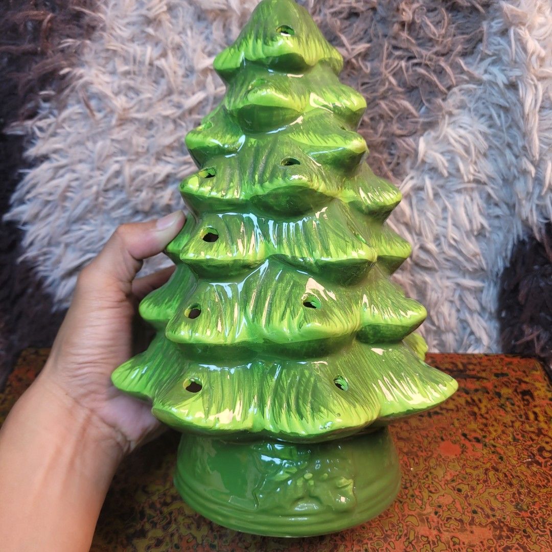 Around 1 kilo Classic Ceramic Christmas Tree Luminary Decor. (Category: Vintage Collectibles) located in Pasig City. Submitted by hoa_japan_surplus_32023 (Listing ID 1463223967, Image 2). Description: 10.5x7.5 inches, approx. 🗣Note: Minor surface paint loss in some areas, consistent with its vintage condition. ❌️NON-COD ✅️ PAYMENT FIRST POLICY ✅️ FIRST TO PAY _____________________________________________ ‼️SHIPPING OPTION‼️ 📌Flash Express, J&T,